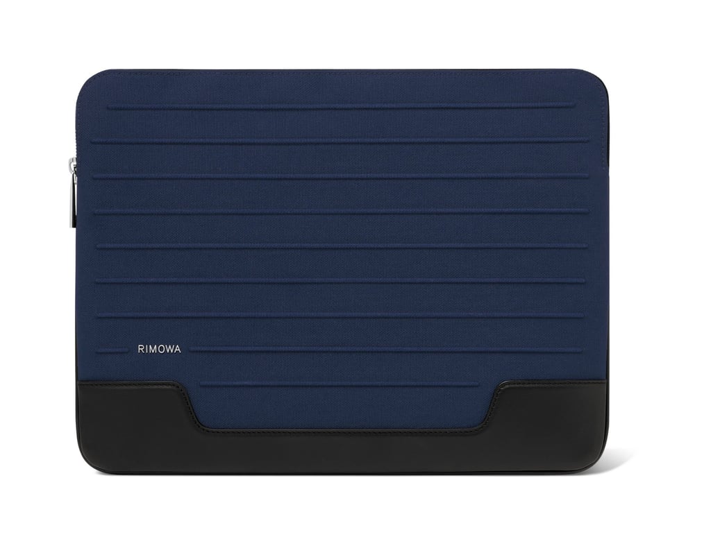 The slimmer Rimowa Never Still flat pouch can fit a laptop and plenty of other travel essentials