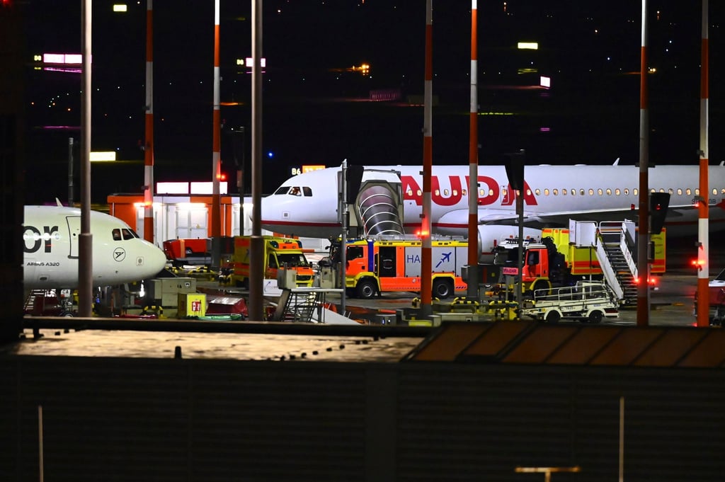 Fire department vehicles arrive at Hamburg Airport on Saturday after a vehicle broke through security and entered the premises. Photo: AP