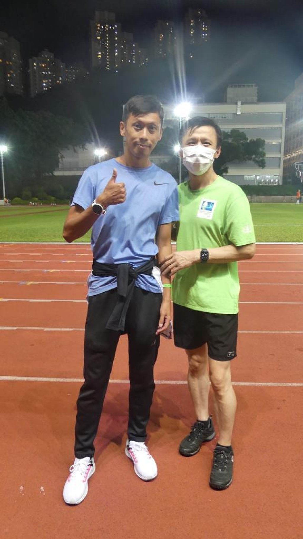 Liang Zhang (right) at the Fearless Dragon running club Photo: Handout
