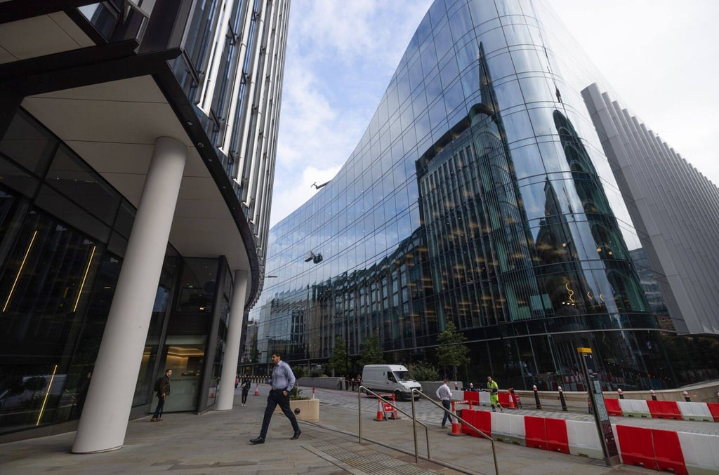 Commercial office buildings in London on October 25. UK office workers are working from home an average of 2 days a week, compared with 1.7 in the US. Photo: Bloomberg