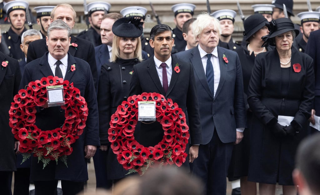 From left, UK Labour leader Keir Starmer, former prime minister Liz Truss, Prime Minister Rishi Sunak, former prime minister Boris Johnson and former prime minister Theresa May attend the National Service of Remembrance at the Cenotaph in London on Sunday. Photo: Reuters