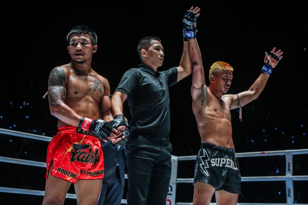 Superlek’s hand is raised after his decision victory over Rodtang.