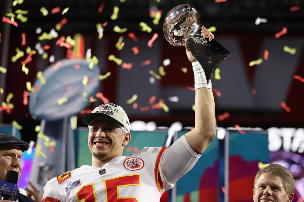 Kansas City Chiefs quarterback Patrick Mahomes hoists the Vince Lombardi Trophy after defeating the Philadelphia Eagles in Super Bowl LVII at State Farm Stadium in Glendale, Arizona, on February 12. Photo: EPA-EFE