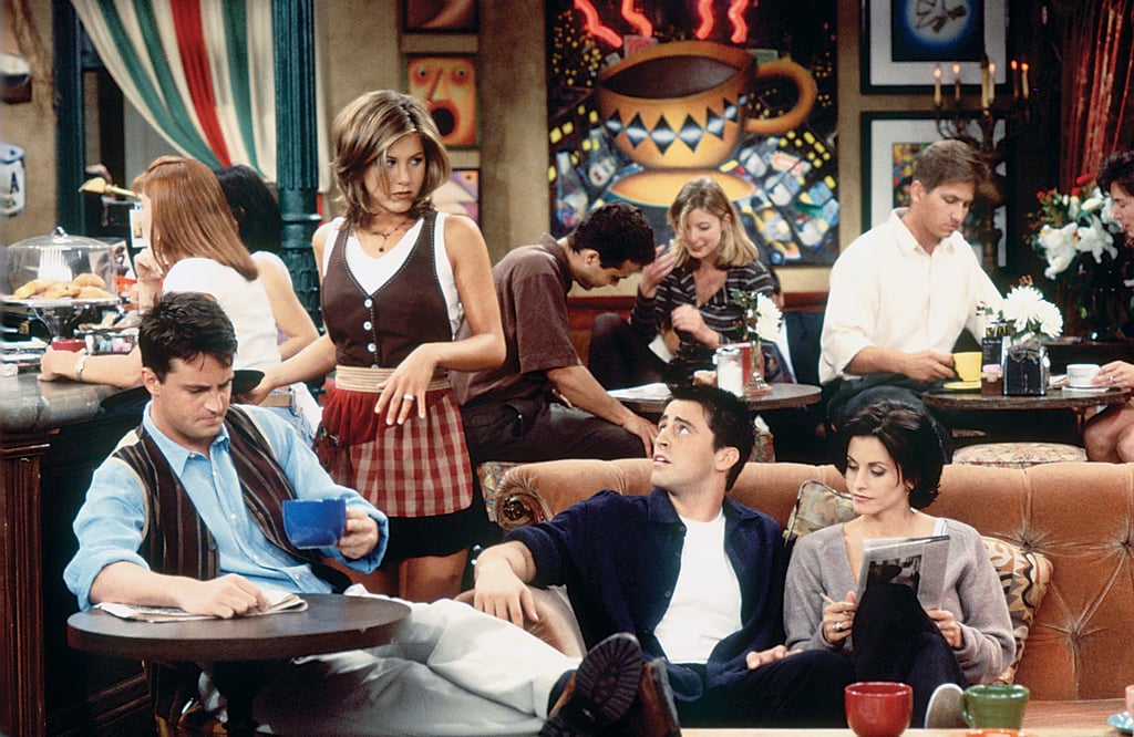 A still from “Friends” episode “The One With the Breast Milk Episode 2” shows Matthew Perry (left) as Chandler Bing and fellow cast members Jennifer Aniston, Matt Le Blanc, and Courteney Cox in Central Perk with its orange sofa. Photo: Gary Null/NBCU/Getty Images