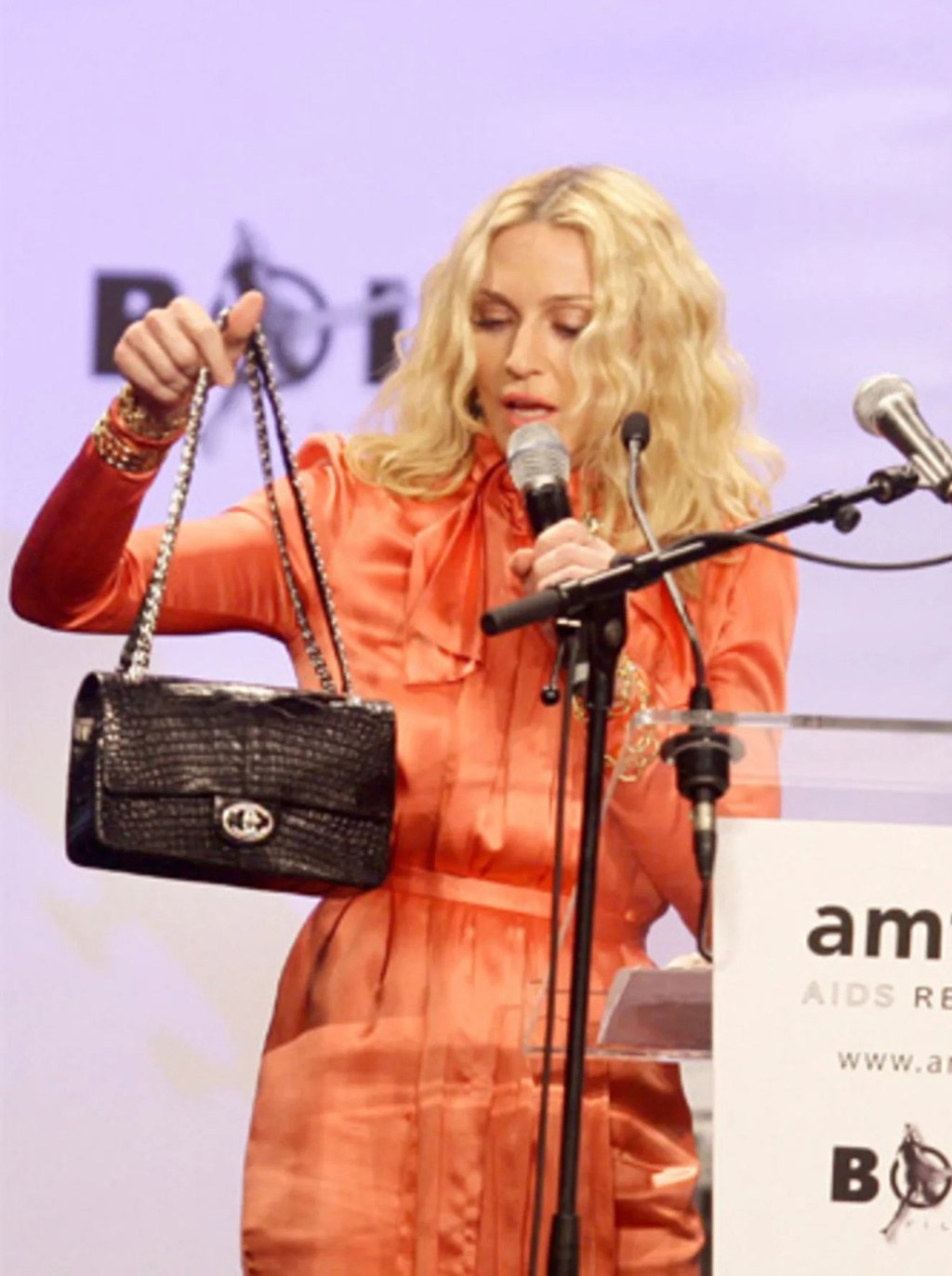 Madonna with the black version of the Chanel Diamond Forever. Photo: Chanel