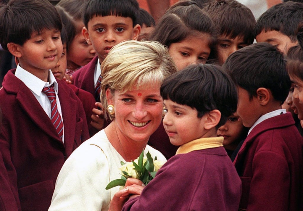 Princess Diana meets children during her visit to a Hindu temple in London in May 1997, three months before she died. Photo: EPA