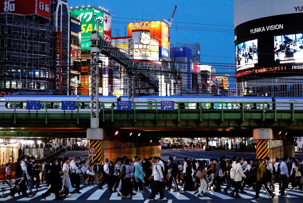 People cross a road in Shinjuku, Tokyo. Child pornography is illegal in Japan but the law does not include drawn images or anything created by AI, no matter how realistic it is, says Fujiko Yamada of the Child Maltreatment Centre. Photo: Reuters People cross a road in Shinjuku, Tokyo. Child pornography is illegal in Japan but the law does not include drawn images or anything created by AI, no matter how realistic it is, says Fujiko Yamada of the Child Maltreatment Centre. Photo: Reuters