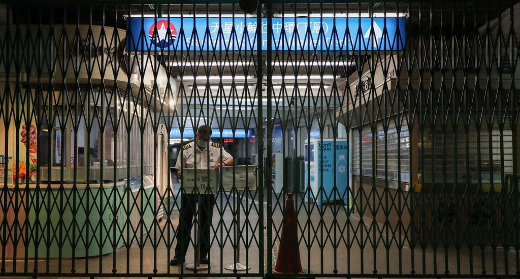 The gates of the Star Ferry terminal in Tsim Sha Tsui are closed as severe Tropical Storm Kompasu nears Hong Kong in 2021. When the No 8 storm signal is hoisted, ferry services in Hong Kong are suspended. Photo: Sam Tsang