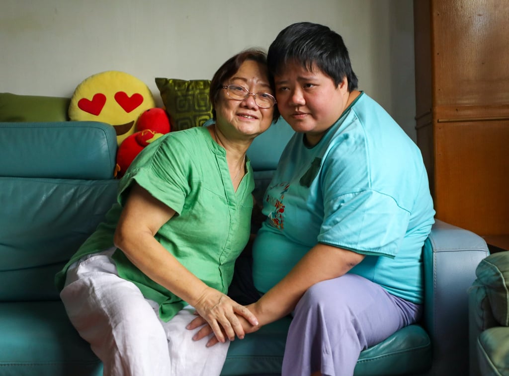 Chan Cho-min (left) and her 34-year-old daughter Wai-kwan at home in Causeway Bay. The mother says Wai-kwan does not get adequate care at a home for people with disabilities, as it is understaffed. Photo: Xiaomei Chen Chan Cho-min (left) and her 34-year-old daughter Wai-kwan at home in Causeway Bay. The mother says Wai-kwan does not get adequate care at a home for people with disabilities, as it is understaffed. Photo: Xiaomei Chen