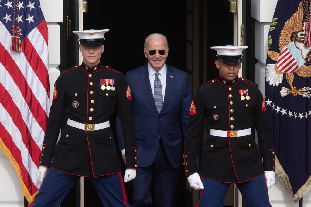 US President Joe Biden, centre, arrives to pardon the National Thanksgiving Turkey at the White House in Washington on Monday. Photo: EPA-EFE US President Joe Biden, centre, arrives to pardon the National Thanksgiving Turkey at the White House in Washington on Monday. Photo: EPA-EFE