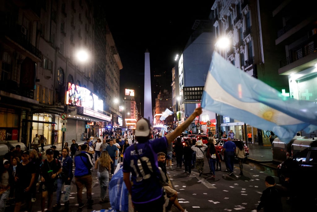 Supporters of Argentine presidential candidate Javier Milei celebrate in Buenos Aires on Sunday. Photo: Reuters Supporters of Argentine presidential candidate Javier Milei celebrate in Buenos Aires on Sunday. Photo: Reuters