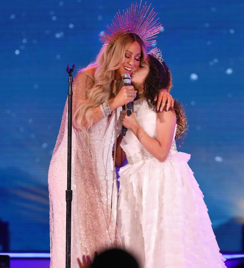 Mariah Carey and Monroe Cannon s cutest mini me fashion looks the All I Want For Christmas is You singer and her daughter twin in Burberry metallic pink ski jackets silky PJs and
