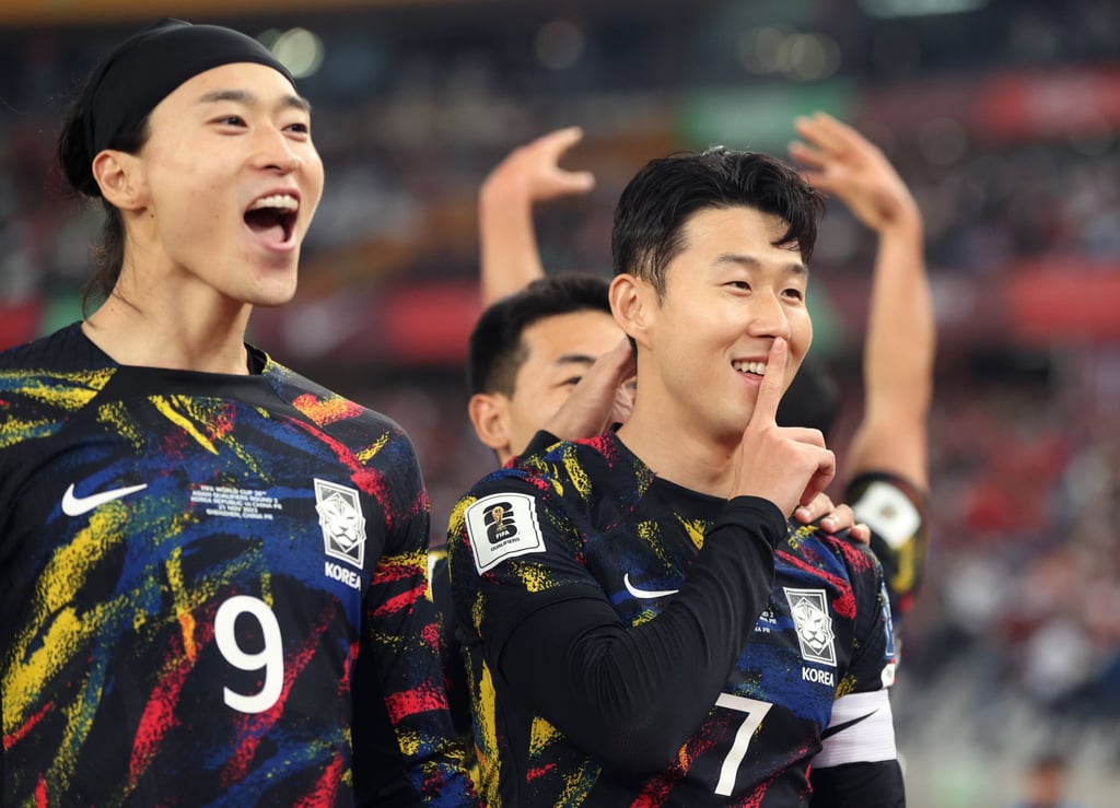 Son Heung-min celebrates a goal against China with his teammates. Photo: Xinhua