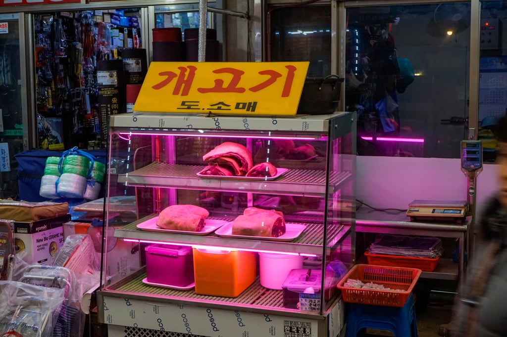 A shop selling dog meat at a market in Anyang, South Korea. Photo: Shutterstock A shop selling dog meat at a market in Anyang, South Korea. Photo: Shutterstock