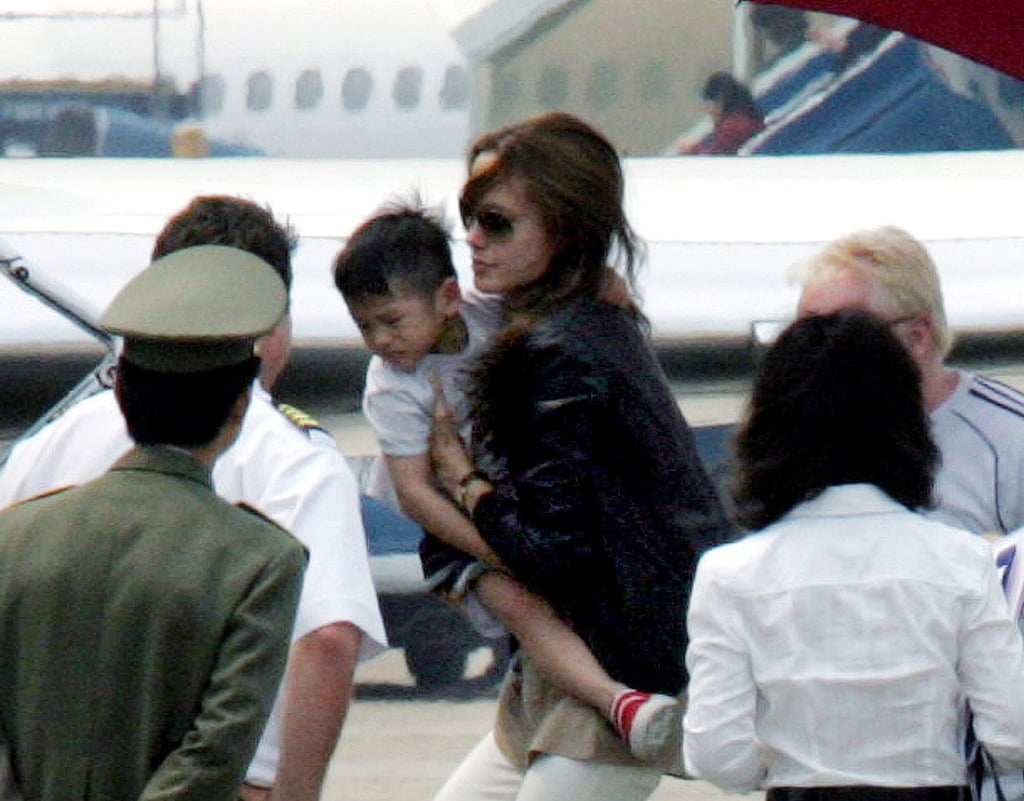 Angelina Jolie carries a newly adopted Pax Thien in March 2007. Photo: AFP/STR Angelina Jolie carries a newly adopted Pax Thien in March 2007. Photo: AFP/STR