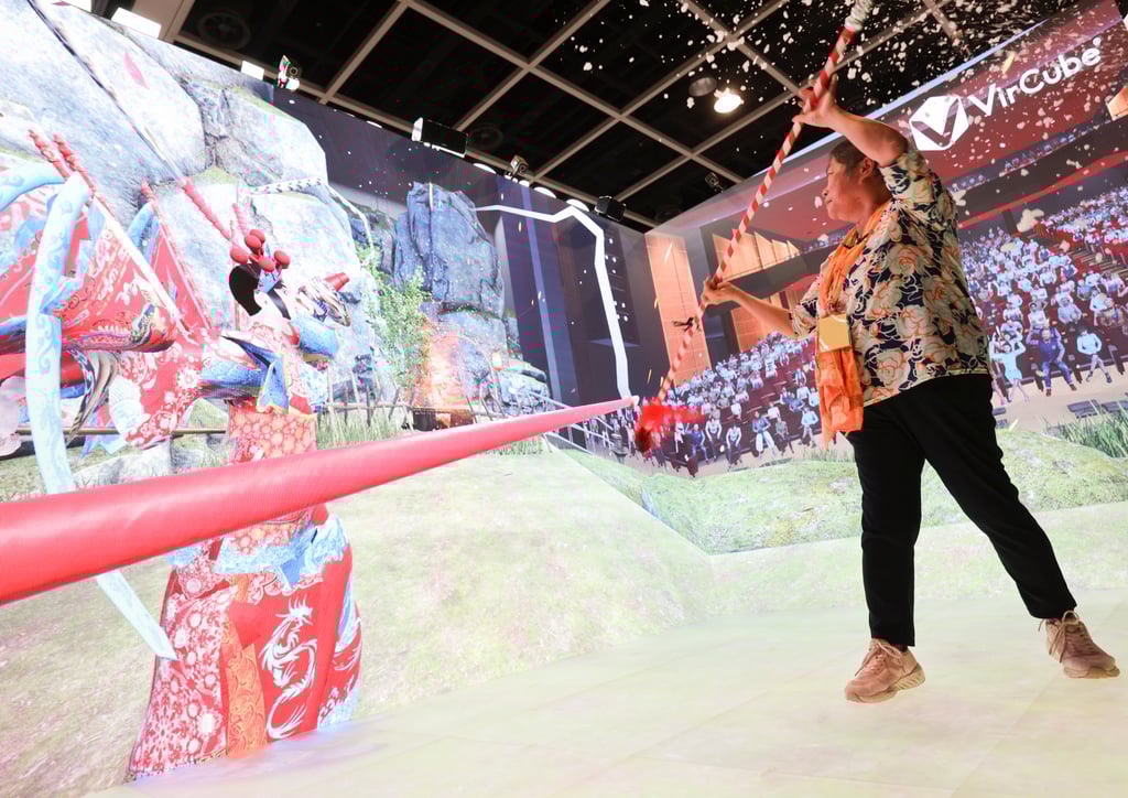 Sherra Ho inside the VirCube XR Space at the gerontech expo. “Many residents can only watch TV as their only activity, which can be boring,” said Terence Tseng, CEO of Motive Force, which designed the game. Photo: May Tse