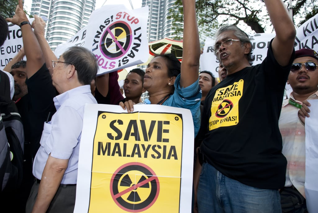 A protest in front of Petronas Twin Towers, Kuala Lumpur, in 2011 against the proposed Lynas rare earth plant to be built in Gebeng. Photo: Shutterstock