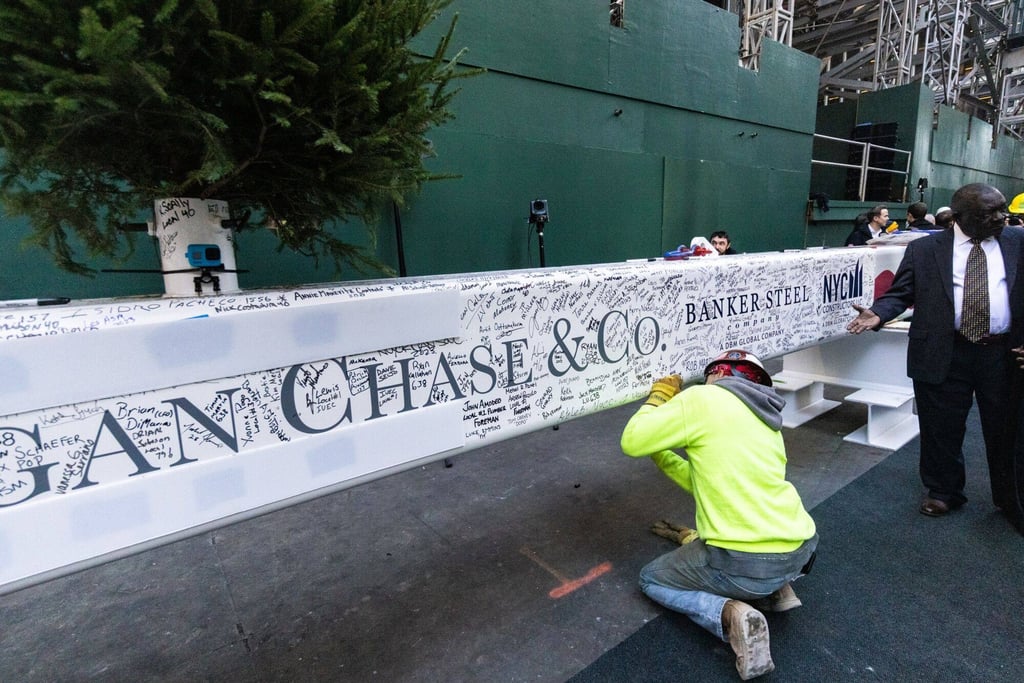A construction worker signs a steel beam during an event at 270 Park Avenue, JPMorgan Chase’s new global headquarters building, in New York, US, on Monday. Photo: Bloomberg A construction worker signs a steel beam during an event at 270 Park Avenue, JPMorgan Chase’s new global headquarters building, in New York, US, on Monday. Photo: Bloomberg