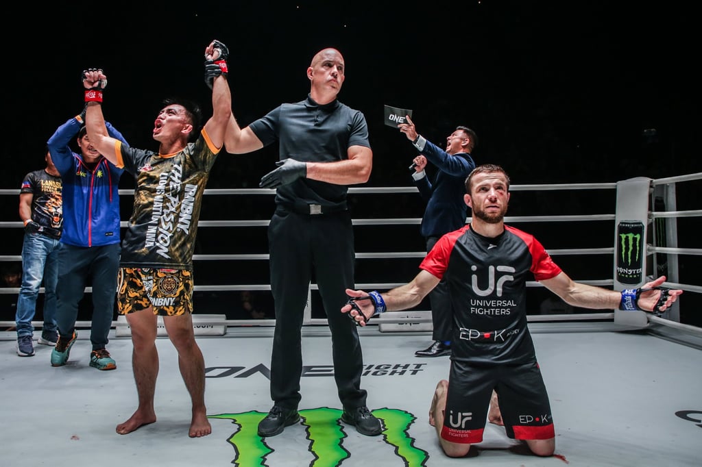 Joshua Pacio celebrates his win over Mansur Malachiev.