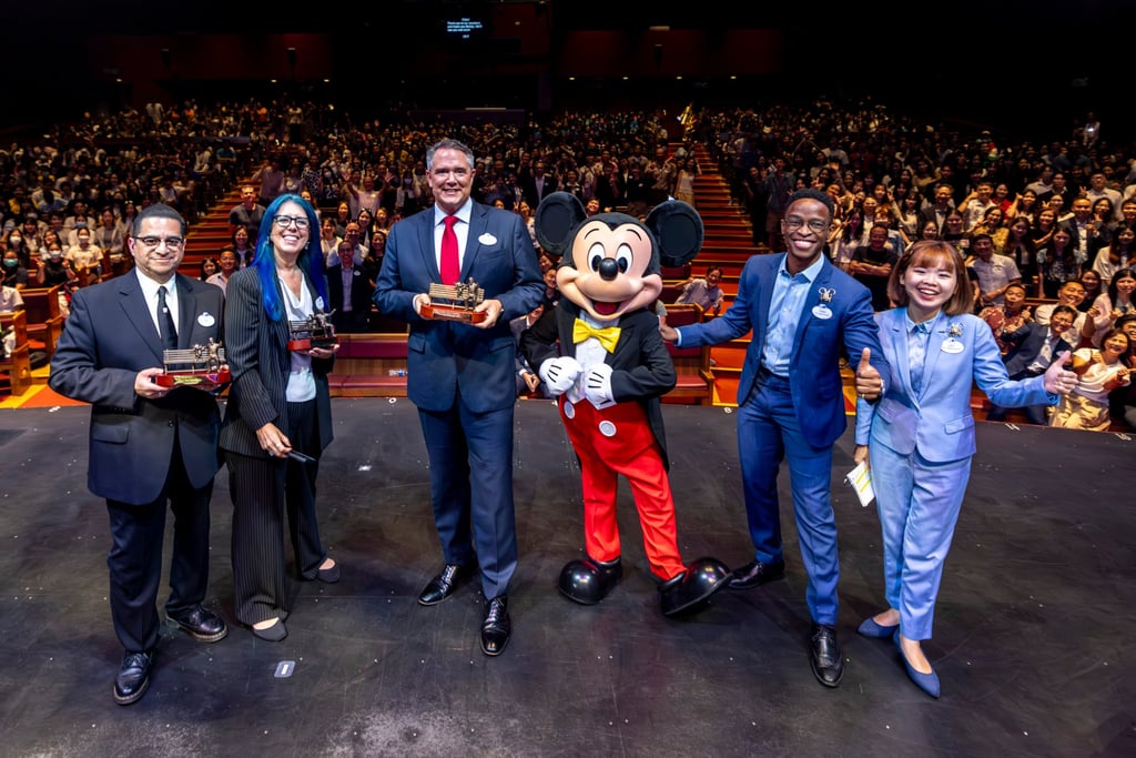 Edward Ovalle (far left), archives manager at Walt Disney Archives, joins his Disney colleagues at Hong Kong Disneyland Resort, including its managing director Michael Moriarty (third left), last month for its official ceremony celebrating 100 years of Disney and the resort’s 18th anniversary.