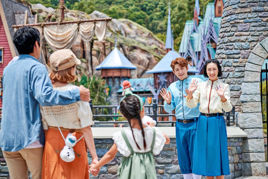 Disney cast members, who are known as citizens of Arendelle in World of Frozen, form part of the immersive theatrical experience at Hong Kong Disneyland Resort’s new themed land.