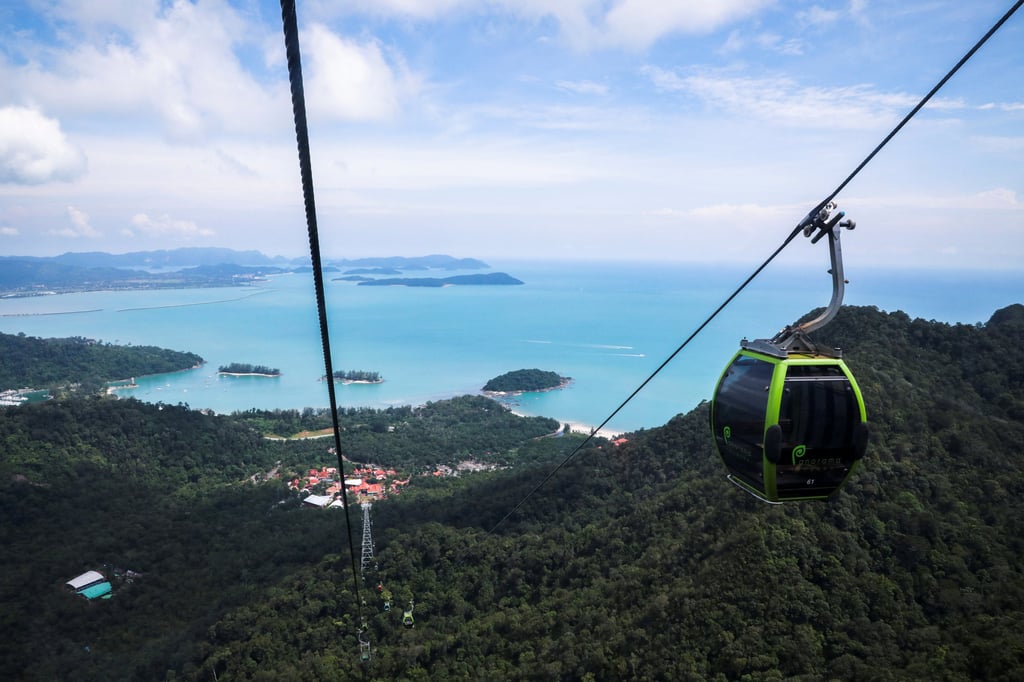 A cable car on its way up to Langkawi’s Sky Bridge. Malaysians heading to China can stay for 15 days visa-free, while Chinese visitors will have double the time to travel in Malaysia. Photo: Reuters A cable car on its way up to Langkawi’s Sky Bridge. Malaysians heading to China can stay for 15 days visa-free, while Chinese visitors will have double the time to travel in Malaysia. Photo: Reuters