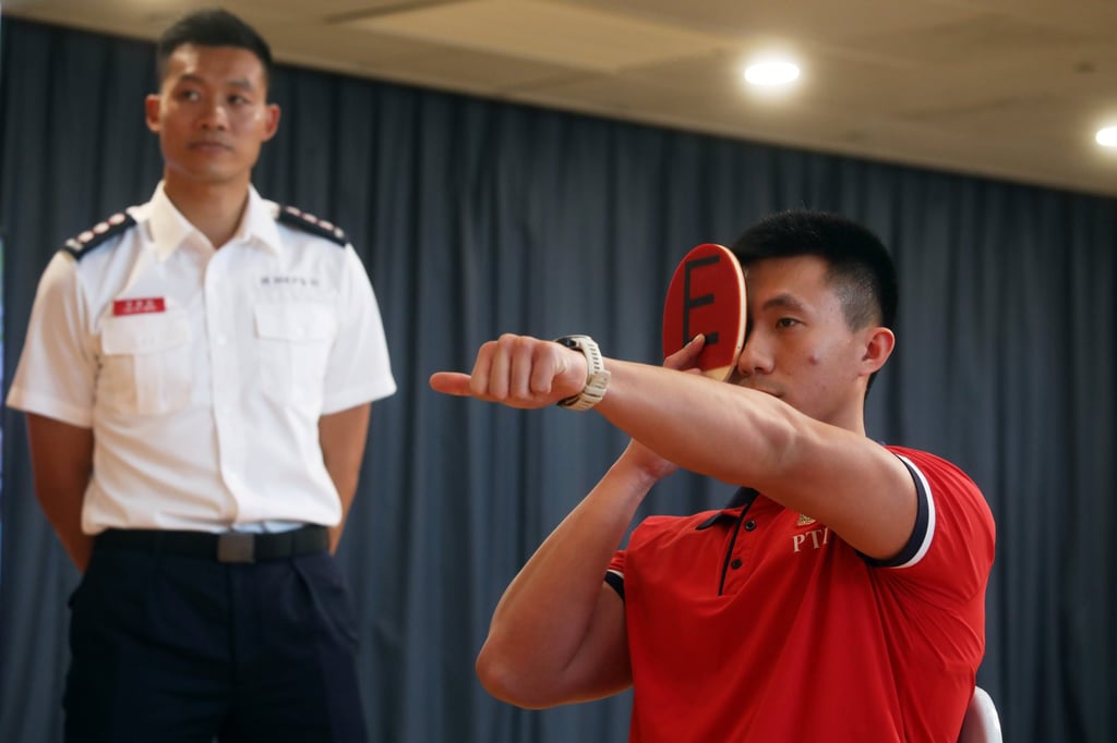Academy commandant Yiu Men-yeung (left) says firefighters cannot suffer from severe myopia. Photo: Sun Yeung