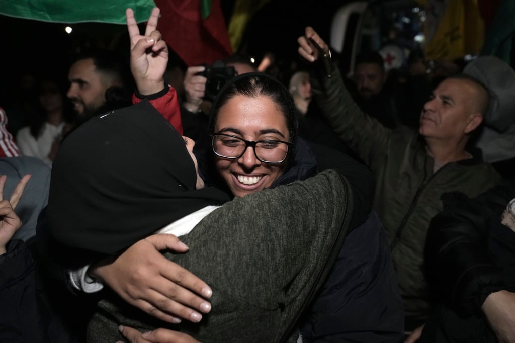 A freed Palestinian prisoner being greeted in the West Bank town of Ramallah early Wednesday. Photo: AP A freed Palestinian prisoner being greeted in the West Bank town of Ramallah early Wednesday. Photo: AP