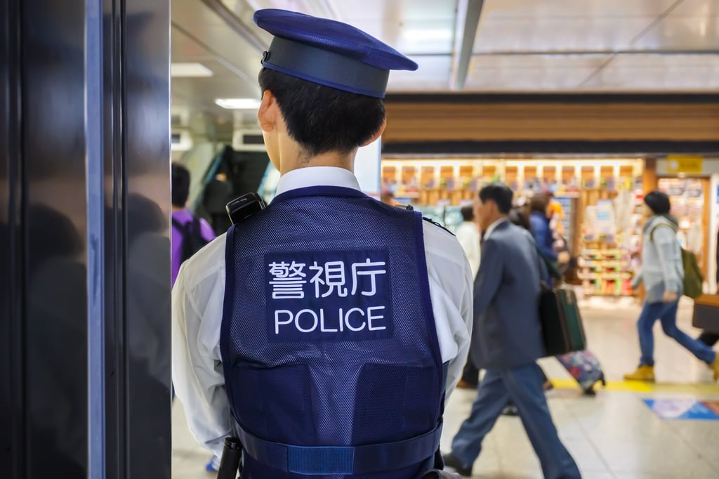 A police officer in Tokyo. There has been a reported increase in the number of smash-and-grab robberies targeting luxury goods stores across Tokyo in the last year. Photo: Shutterstock A police officer in Tokyo. There has been a reported increase in the number of smash-and-grab robberies targeting luxury goods stores across Tokyo in the last year. Photo: Shutterstock