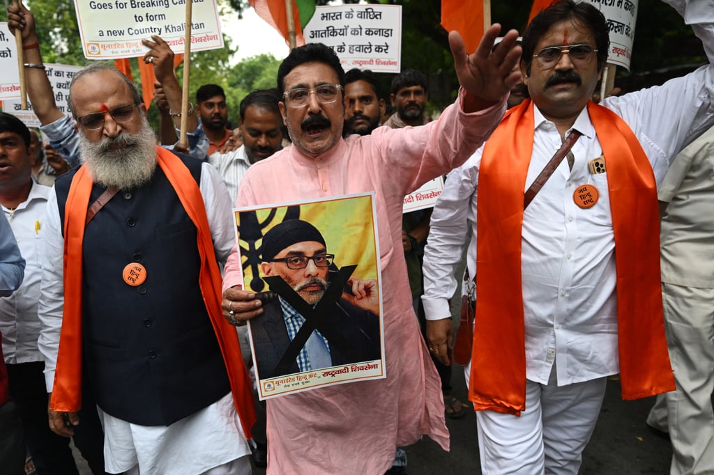 Hindus protest in India after Canada blamed Delhi for the killing of Sikh separatist activist Hardeep Singh Nijjar near Vancouver. The man in the centre holds a photograph of another Sikh separatist, Gurpatwant Singh Pannun. The US later foiled an attempt to kill him, and also linked the crime to Delhi. Photo: AFP Hindus protest in India after Canada blamed Delhi for the killing of Sikh separatist activist Hardeep Singh Nijjar near Vancouver. The man in the centre holds a photograph of another Sikh separatist, Gurpatwant Singh Pannun. The US later foiled an attempt to kill him, and also linked the crime to Delhi. Photo: AFP