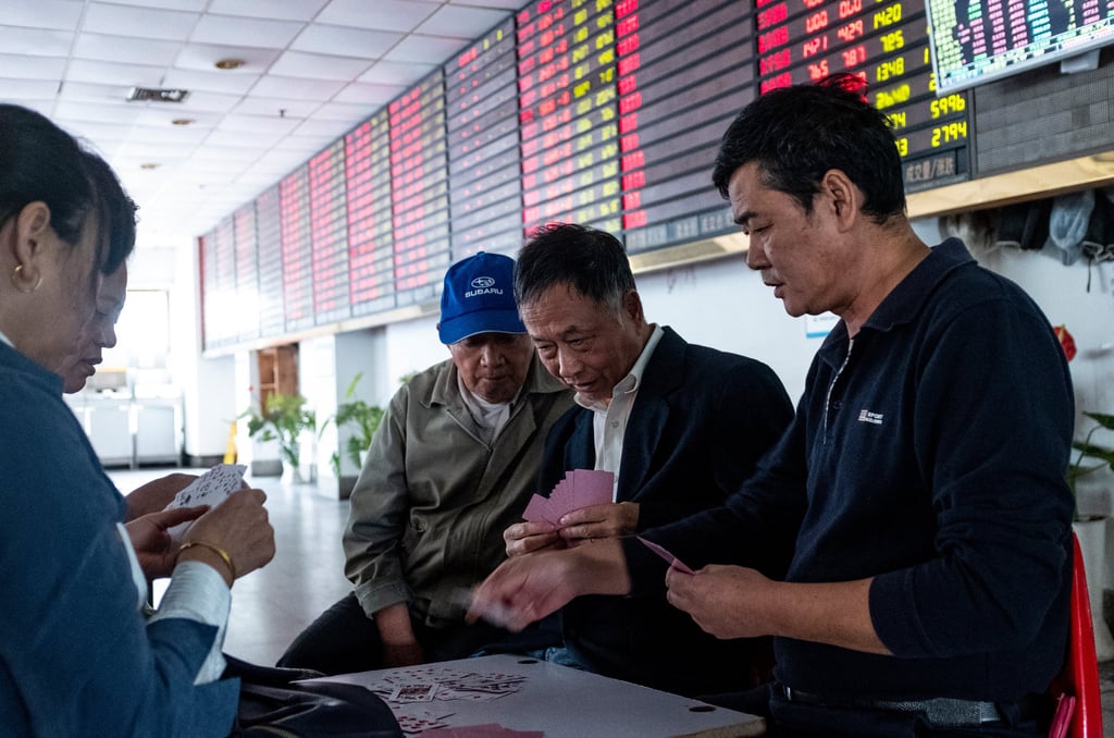 An electronic board displays stock information at a securities brokerage in Shanghai in this file photo from October 2018. Photo: AFP