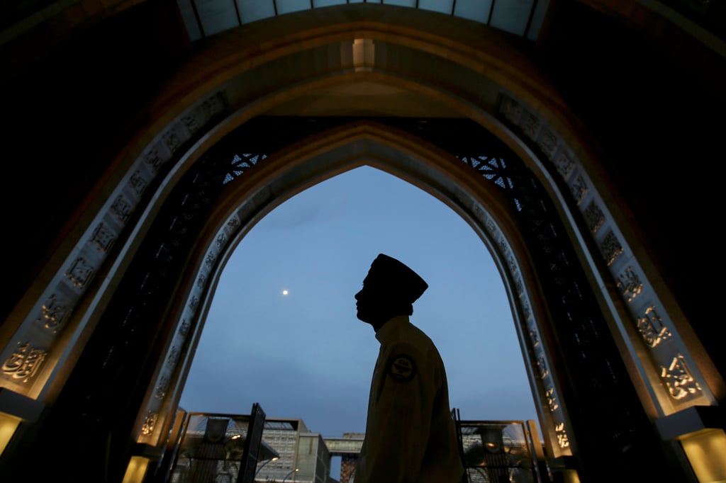 A worshipper at a mosque in Kuala Lumpur. The constitution grants each of Malaysia’s 13 states the power to prosecute Muslims who breach religious offences, with same-sex relations being one of them. Photo: AP A worshipper at a mosque in Kuala Lumpur. The constitution grants each of Malaysia’s 13 states the power to prosecute Muslims who breach religious offences, with same-sex relations being one of them. Photo: AP