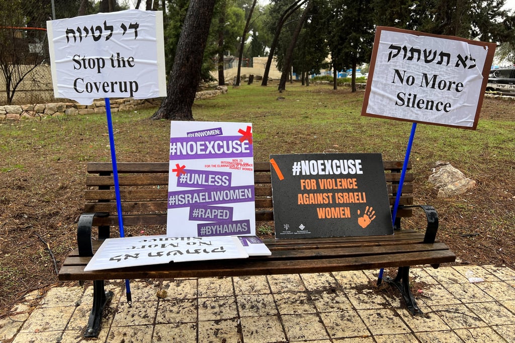 Signs against what protesters describe as international silence over sexual violence perpetrated against Israeli women during the attack by Hamas on southern Israel on October 7, are displayed on a bench at a protest in Jerusalem on November 27. Photo: Reuters Signs against what protesters describe as international silence over sexual violence perpetrated against Israeli women during the attack by Hamas on southern Israel on October 7, are displayed on a bench at a protest in Jerusalem on November 27. Photo: Reuters