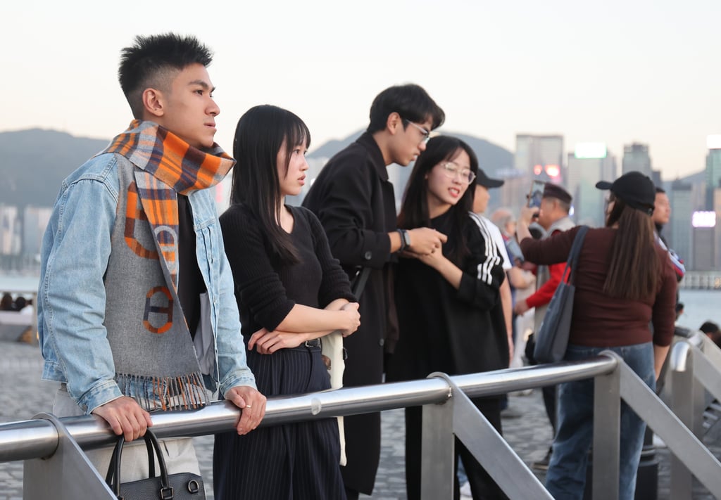 People visit Tsim Sha Tsui. The forecaster predicted the difference in the day and night temperature would be significant on Thursday, which coincides with the lunar calendar’s daxue or “great snow” in English. Photo: Edmond So