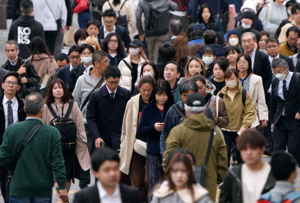Pedestrians in Shinjuku, Tokyo. Japan is facing a labour shortage but the country’s outdated corporate culture is pushing more young Japanese to look elsewhere for jobs. Photo: EPA-EFE Pedestrians in Shinjuku, Tokyo. Japan is facing a labour shortage but the country’s outdated corporate culture is pushing more young Japanese to look elsewhere for jobs. Photo: EPA-EFE