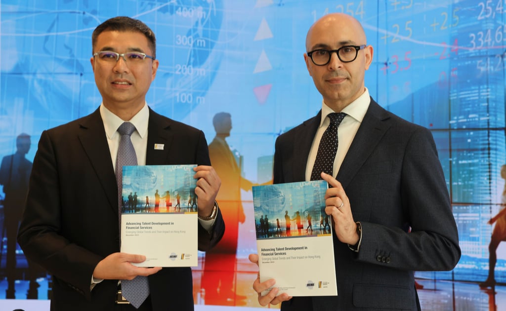Enoch Fung (left), executive director of Hong Kong Institute for Monetary and Financial Research, and HKIMR head Giorgio Valente unveil the latest talent report on Wednesday. Photo: Yik Yeung-man Enoch Fung (left), executive director of Hong Kong Institute for Monetary and Financial Research, and HKIMR head Giorgio Valente unveil the latest talent report on Wednesday. Photo: Yik Yeung-man