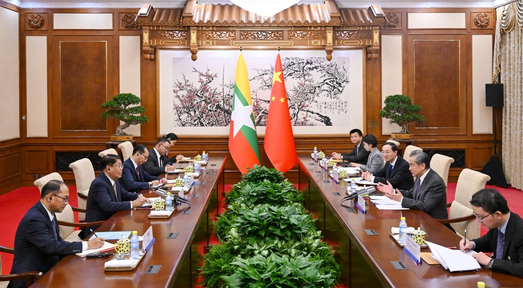 Wang Yi and Than Swe hold talks ahead of a regional summit in the Chinese capital. Photo: Xinhua