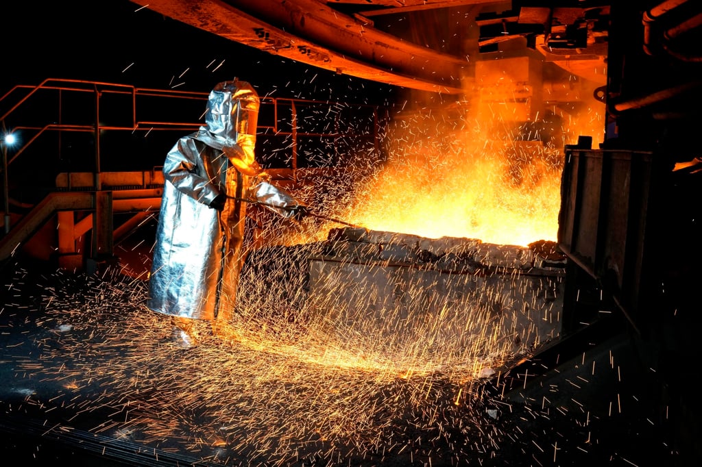 A worker at an Indonesian nickel processing plant in South Sulawesi. Photo: AP A worker at an Indonesian nickel processing plant in South Sulawesi. Photo: AP