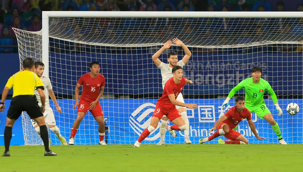 Full-back Jojo (grounded) was involved in a number of Herculean defensive efforts in Hangzhou. Photo: Dickson Lee Full-back Jojo (grounded) was involved in a number of Herculean defensive efforts in Hangzhou. Photo: Dickson Lee
