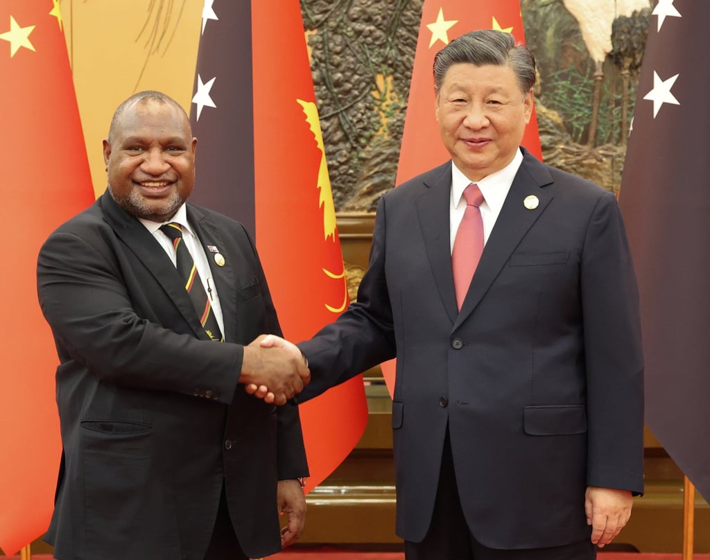 Marape shakes hands with Chinese President Xi Jinping at the Great Hall of the People in Beijing in October. Photo: Xinhua Marape shakes hands with Chinese President Xi Jinping at the Great Hall of the People in Beijing in October. Photo: Xinhua