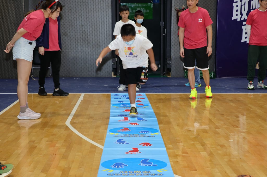 Children take part in the mini basketball challenges at the tournament. Photo: Bharat Khemlani