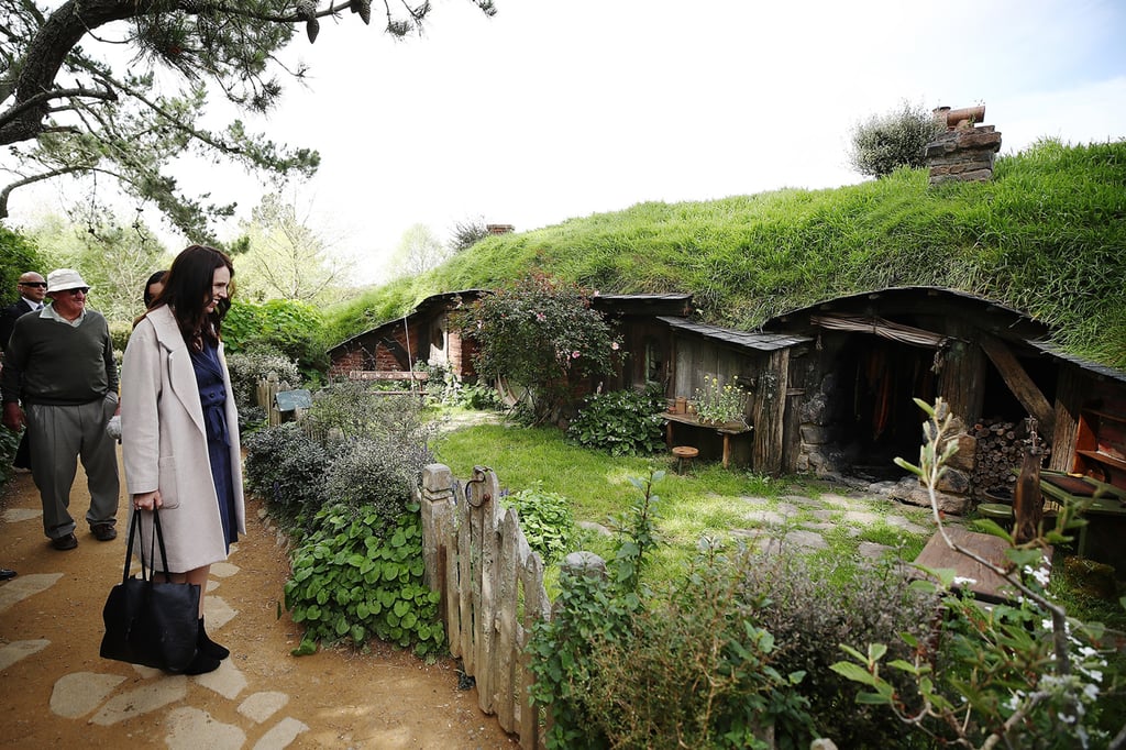 New Zealand Prime Minister Jacinda Ardern tours Hobbiton in October 2018. Photo: TNS