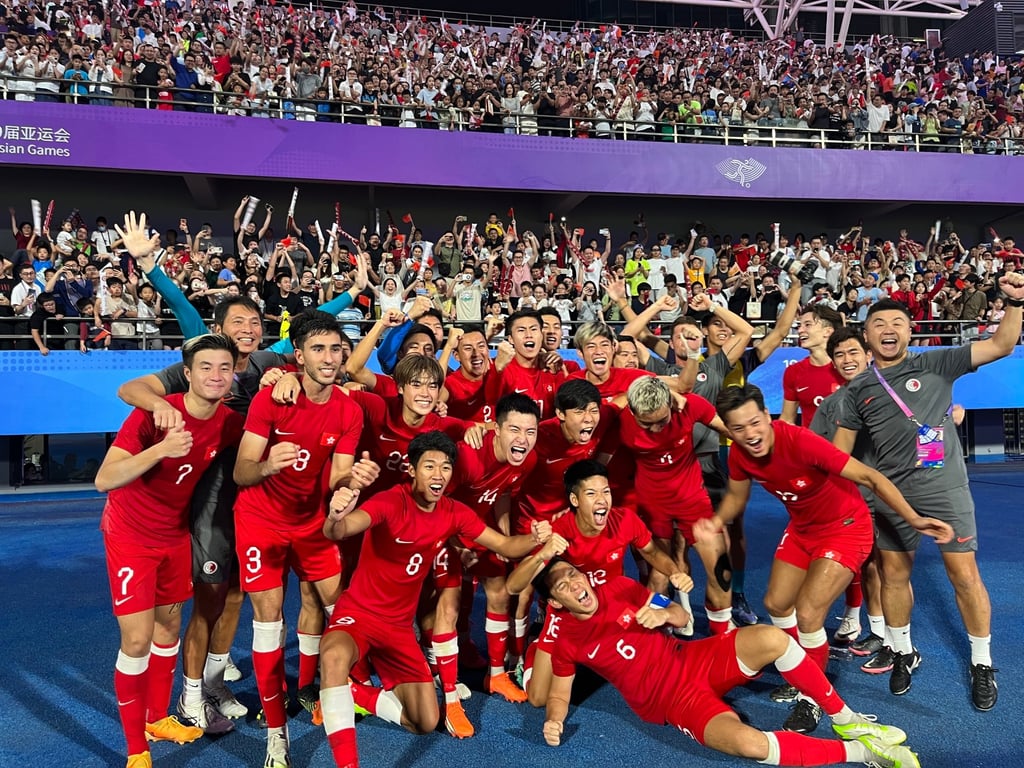 Hong Kong’s players are ecstatic after their shock win over Iran in the Asian Games quarter-finals. Photo: Dickson Lee
