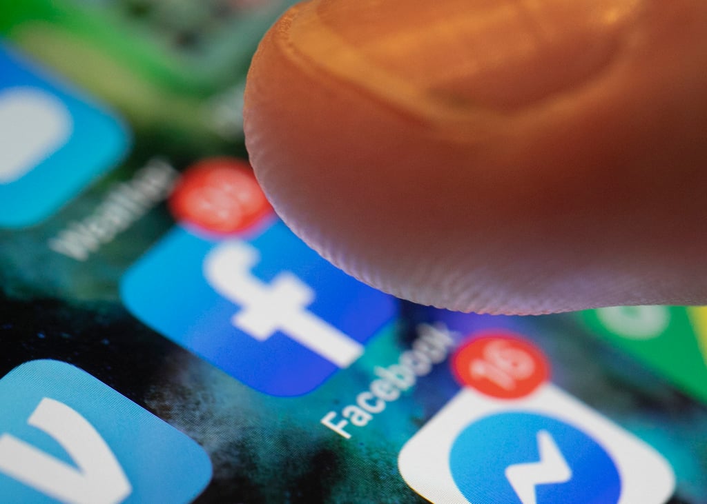 Fake property listings were a particular problem on Facebook, police said. Photo: AP Fake property listings were a particular problem on Facebook, police said. Photo: AP