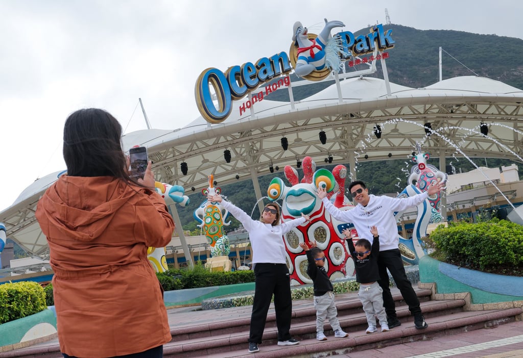 Visitors take photos outside Ocean Park. The company’s annual deficit reached HK$200 million before easing to HK$31.8 million in 2020-21, when the government provided a HK$5.4 billion bailout. Photo: Jelly Tse