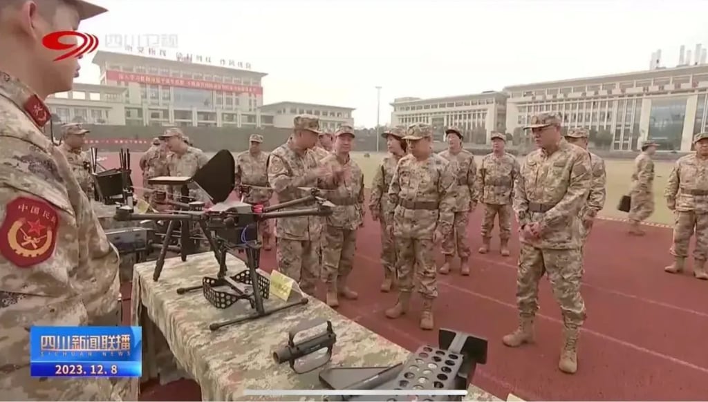Officials dressed in military uniforms for a visit to a military base. Photo: Weibo/ 湖北朱会明 Officials dressed in military uniforms for a visit to a military base. Photo: Weibo/ 湖北朱会明