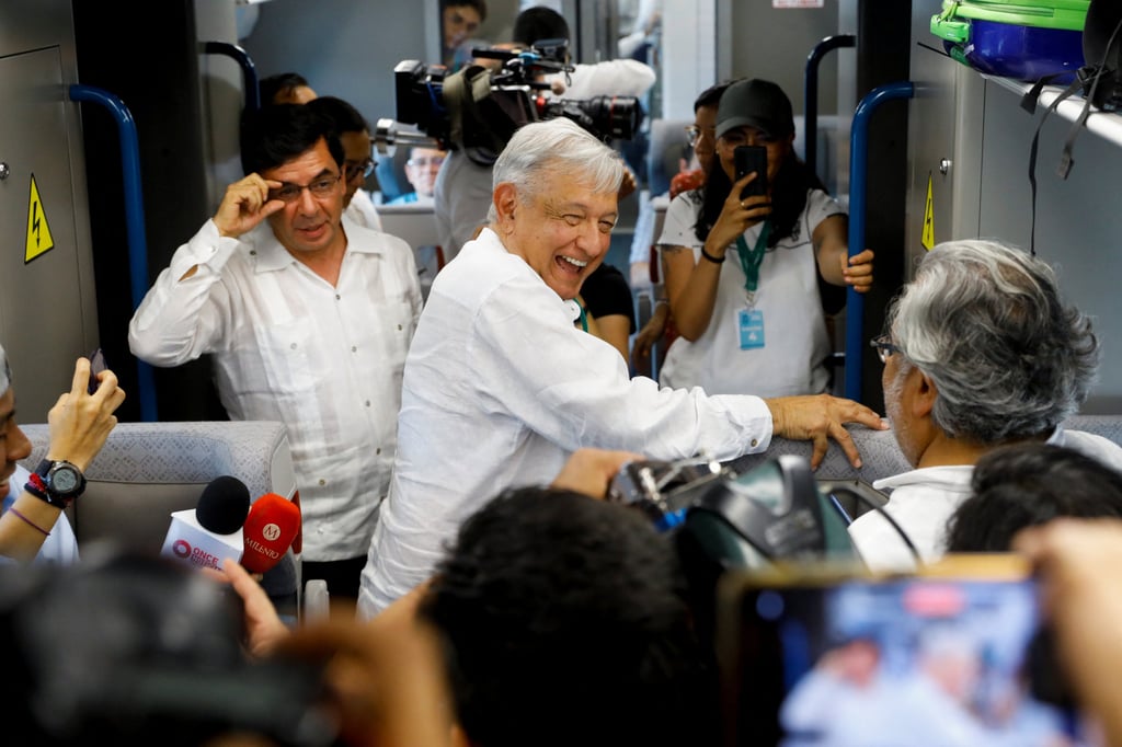 Mexican President Andres Manuel Lopez Obrador (centre) travels on the Maya Train on its inaugural trip on Friday. Photo: Reuters