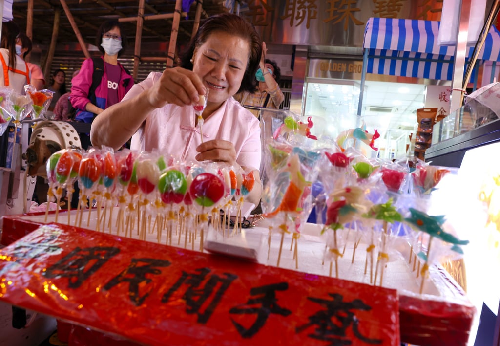 Visitors can enjoy a range of local delicacies at more than 30 stalls in the night market. Photo: Yik Yeung-man Visitors can enjoy a range of local delicacies at more than 30 stalls in the night market. Photo: Yik Yeung-man