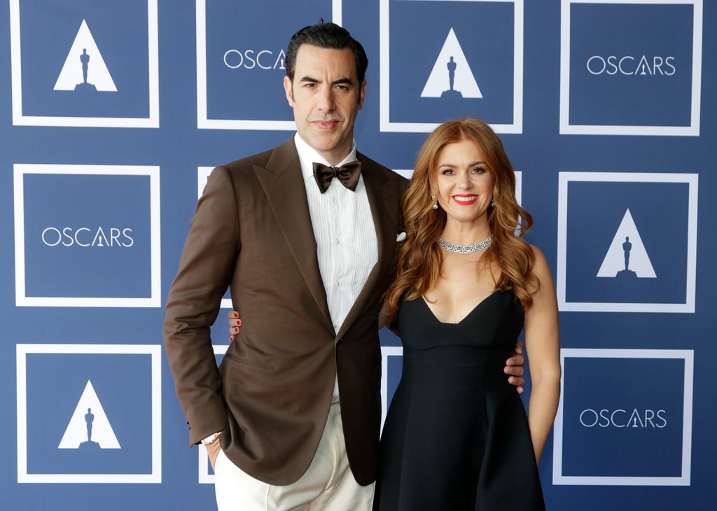 Sacha Baron Cohen and Isla Fisher pose for a photo during a screening of the Oscars in 2021, in Sydney, Australia. Photo: AP Sacha Baron Cohen and Isla Fisher pose for a photo during a screening of the Oscars in 2021, in Sydney, Australia. Photo: AP