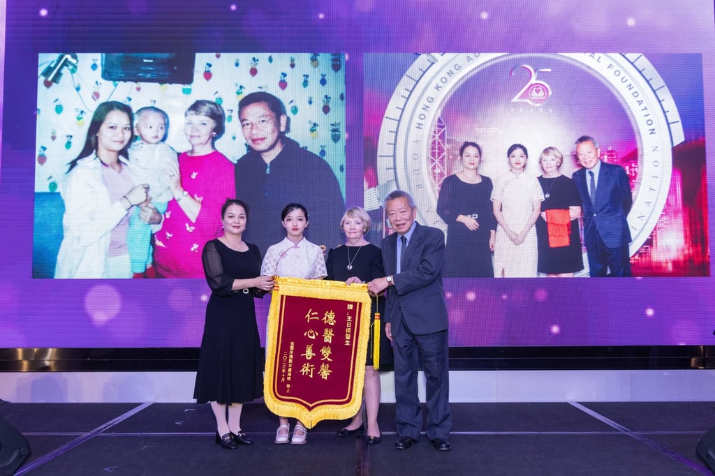 Lu Jinqing (second left), and her mother, Wu Xueling (far left), pay tribute to Dr Buddy Wong (right), former medical director of Hong Kong Adventist Hospital Foundation’s Hearing Fund, alongside his wife, Dorothy, at the gala dinner.